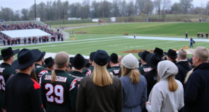The football team and Amish community members together at a game